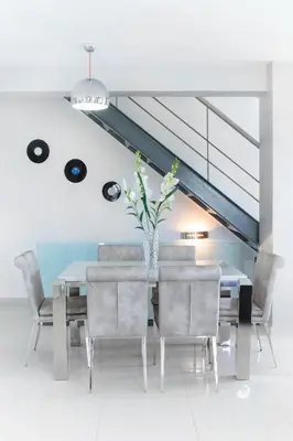 a dining room with a table and chairs at Andreas Villa in Kato Daratso