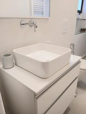 a white sink on a counter in a bathroom at Orange Tree in Chania Town