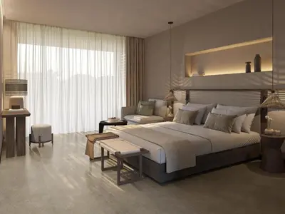 a bedroom with a large bed and a couch at Ikos Kissamos in Kissamos