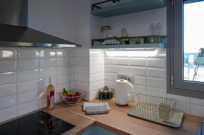a kitchen with a sink and a counter top at Villa Akalli in Frangokastello