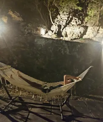 a person laying in a hammock in a chair at Georgia's Dream House in Koprána