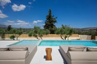 a villa with a swimming pool and a villasteryasteryasteryasteryasteryastery at Elithos Villa in Vryses