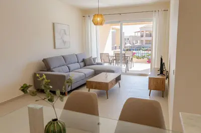 a living room with a couch and a table at Phaedrus Living Seaside Thalassa Cretan 102 in Módhion