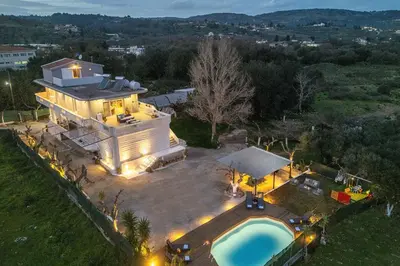 an aerial view of a house with a swimming pool at SI-EL Villa in Vryses