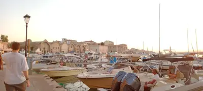 a group of boats are docked in a harbor at Ela Apartment Chania in Chania Town