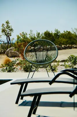 a bench sitting on top of a table at LIViT Condo Elafonisi in Agios Padeleimon