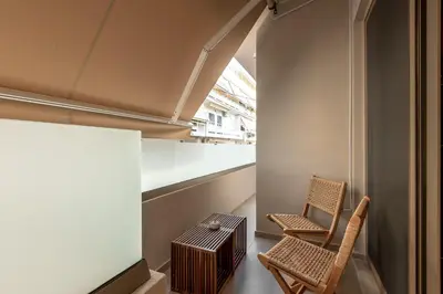 two chairs and a table in a room at Devina Residence 2025 , Luxury City Jacuzzi Apartment in Chania Town