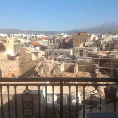 a view of a city from a balcony at Castle Inn in Chania Town