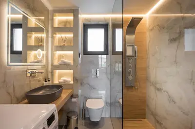 a bathroom with a sink and a toilet at Luna Luxury Living in Tavronitis