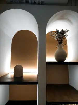 a vase sitting on two shelves with a vase at RosaMaria's Garden in Kounoupidhianá