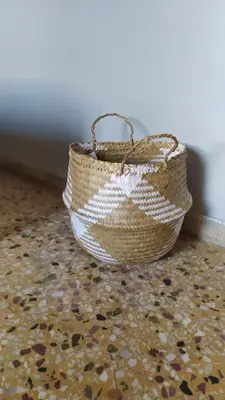 a basket sitting on top of a floor at Chania ELIA apARTment Chalepa in Chania Town