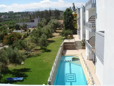 an overhead view of a swimming pool on the side of a building at Popi Hotel Apartments in Agia Marina Nea Kydonias