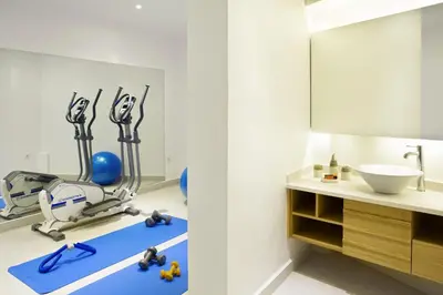 a dental room with a chair and a sink at S&K Villas in Kalamaki Chanion