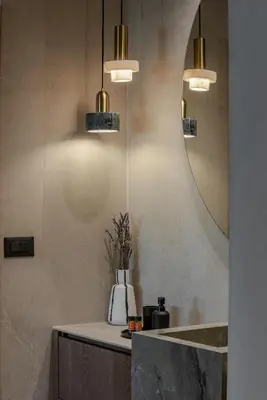 a bathroom with a sink and a mirror at Amara Luxury Suites With Private Hot Tub in Chania Town