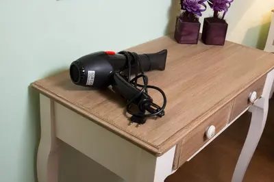 a hair dryer sitting on top of a table at Casa Di Porto in Chania Town