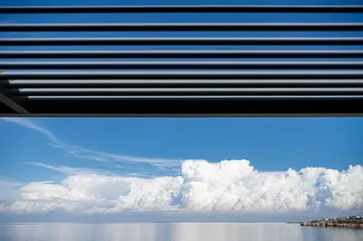 a window with a view of the sky and water at Casa Domenica, 2 bedroom seaside home in Chania Town