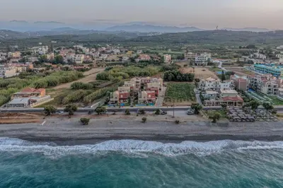 an aerial view of a resort on the beach at Helena's Dream Home in Maleme