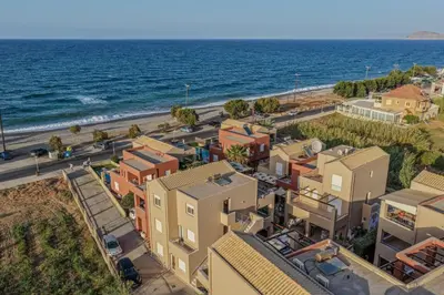 an aerial view of a city and the ocean at Helena's Dream Home in Maleme