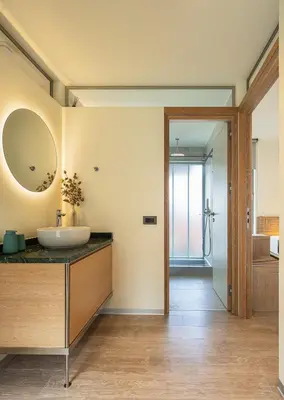 a bathroom with a sink and a mirror on the wall at Alky Luxury Villa in Chania Town