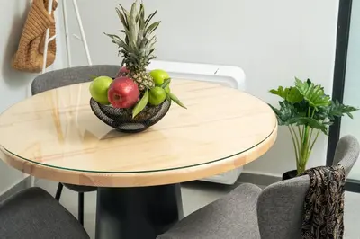 a wooden table with a bowl of fruit on it at Ethea Residences-Orino in Chania Town