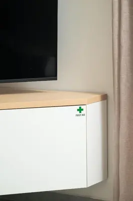 a television on top of a white entertainment center at Ethea Residences-Orino in Chania Town