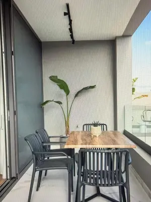 a dining room with a table and chairs at Amazing views in Chania Town