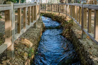 a small stream under a wooden bridge at Traditional Art House Armenoi in Arménoi