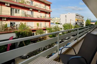 a balcony with a view of a building at Leda's Nea Chora Flat, Near Beach and Old Port in Chania Town