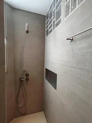 a bathroom with a shower with a shower at Apartment Near Beach & Old Port in Chania Town
