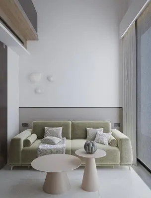 a living room with a couch and two tables at Okeanis Elysium in Daratso