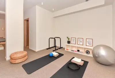 a room with a gym with yoga mats and a ball at Lavender Loft in Chania Town