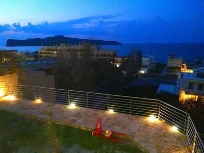 a view of a city at night with lights at Apartment Moderne Wohnung Rubini 3 by Interhome in Chania Town