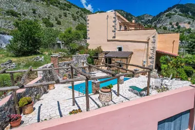 an image of a house with a swimming pool at Stone-Built Traditional Villa with Pool in Sfakia in Ímbros