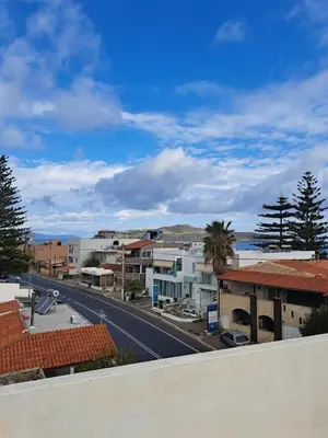 a view of a street in a town with buildings at SeaREN Apartment in Stalos
