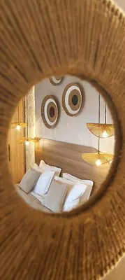 a view of a bedroom with a bed and two lamps at HOLM Ilex & Quercus apartments in Chania Town