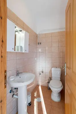 a bathroom with a sink and a toilet at Almyrida Bayview VII - BY APOKORONAS VILLAS in Almirida