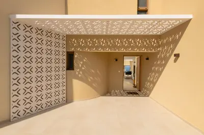 a hallway with a wall with a patterned wall at BelSodi - 3bedroom sea views and heated pool in Chania Town