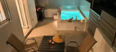 an overhead view of a room with a table and a window at Cozy Apartment with Private Jacuzzi - Fiber Internet - Private Parking in Chania Town