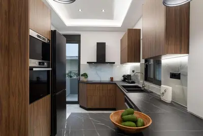 a kitchen with a bowl of fruit on the counter at Elan Stay in Chania Town