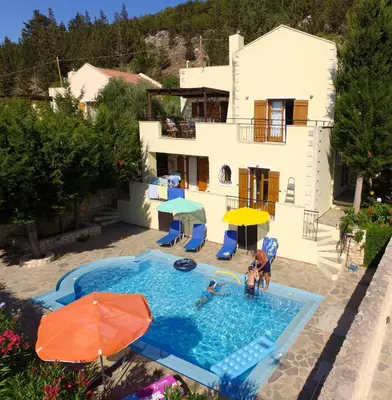 an aerial view of a house with a swimming pool at Villa Rodi in Gavalochori