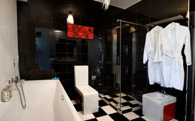 a bathroom with a tub and a toilet and a shower at Villa Emanuele in Gerani Chanion