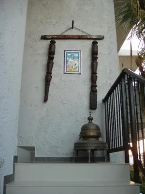 a stairway with a picture on the side of a building at Aris Apartments in Gerani Chanion