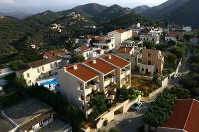 arial view of a village in the mountains at Orestis Hotel Sea View Apartments in Stalos