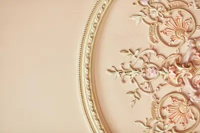 an ornate gold frame on a wall at Domus Renier Boutique Hotel in Chania Town