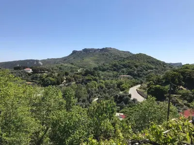 a view of a mountain with a road at Temenia House in Teménia
