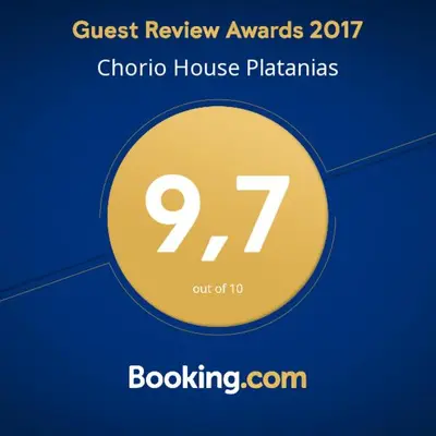 a sign for a guest review awards choctric house plathaus at Chorio House Platanias in Vrísai