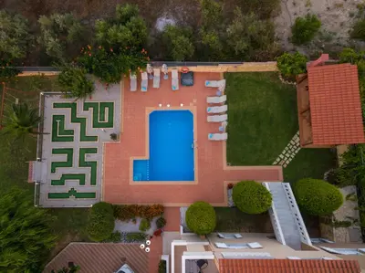 an overhead view of a house with a swimming pool at Villa Aretousa 2 in Agia Marina Nea Kydonias