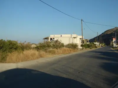 an empty street with a building on the side of the road at Villa-Palaiochora in Palaiochóra