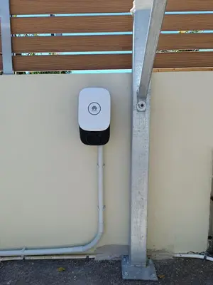a parking meter on the side of a building at Villa Dimokratia in Kolymvari