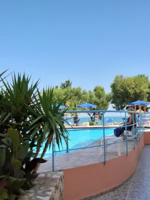 a view of the pool at the resort at Eden Beach Hotel in Agia Marina Nea Kydonias
